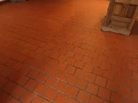 Quarry tile floor before cleaning, color sealing grout, and coating